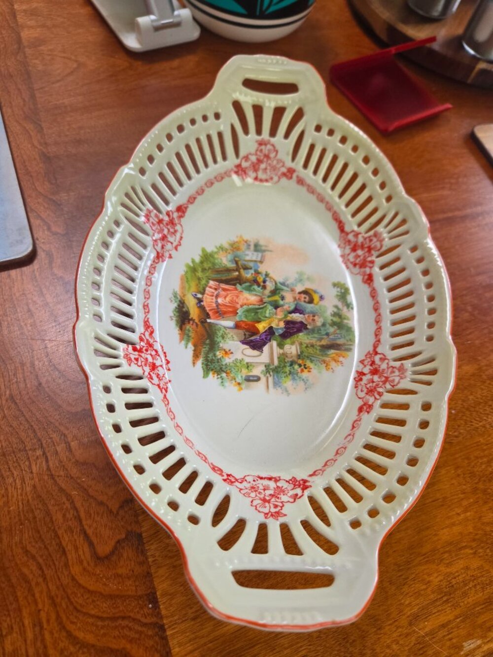 antique German reticulated porcelain serving bowl with courting couple scene